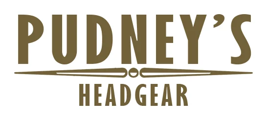 Pudney's Curio Co logo