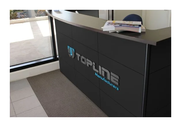 Topline Manufacturers logo