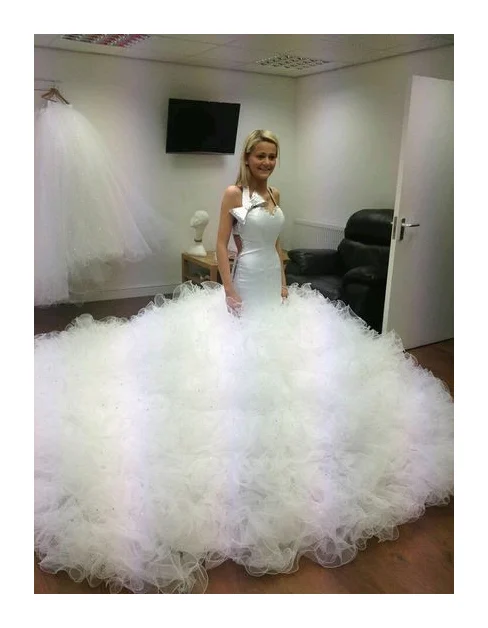 Tess Bridal & Evening Wear logo