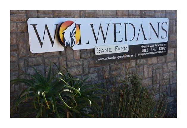 Wolwedans Game Farm logo